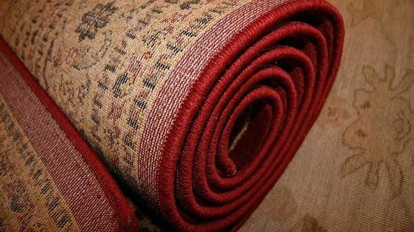 How-to-secure-area-rug-on-top-of-the-carpet-therugsgalfeatured-image