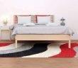 HOW-TO-PLACE-A-RUG-UNDER-BED-RULES-FEATURED-IMAGE
